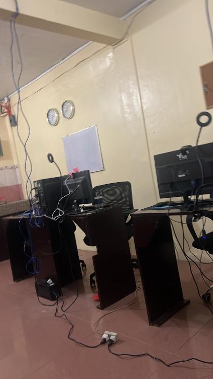 an office with a desk with a computer on it at Upskill Coworking Space in Marilao