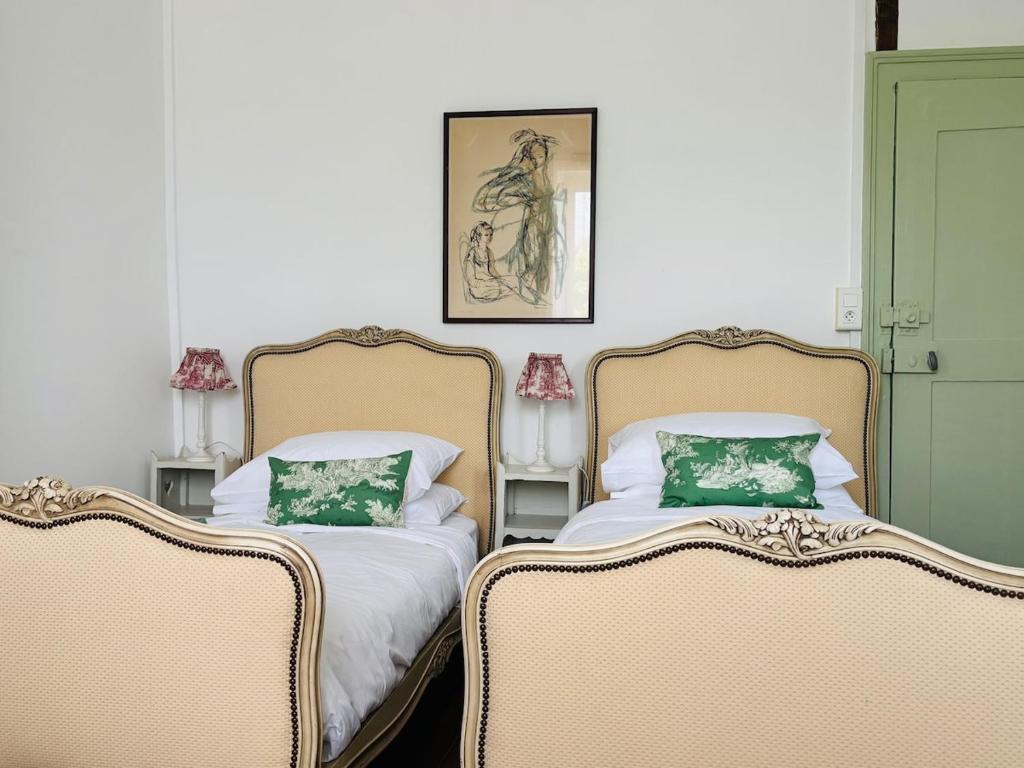 Postel nebo postele na pokoji v ubytování 'Le Meunier' in St Sornin Leulac