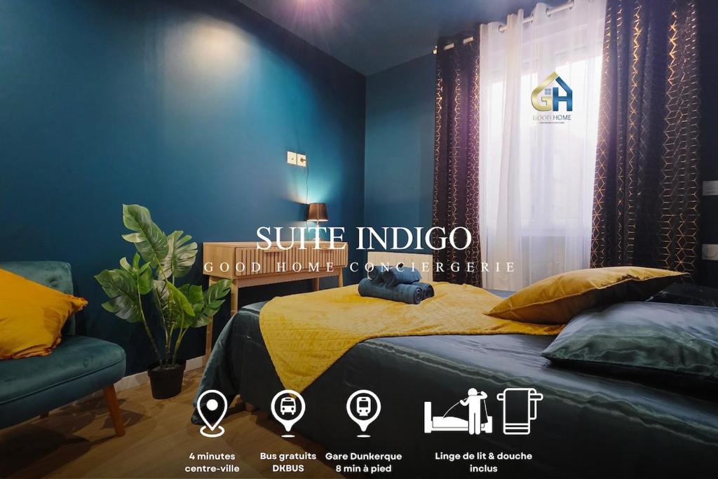 een slaapkamer met een bed met een gele deken bij Suite Indigo - Centre Ville in Duinkerke