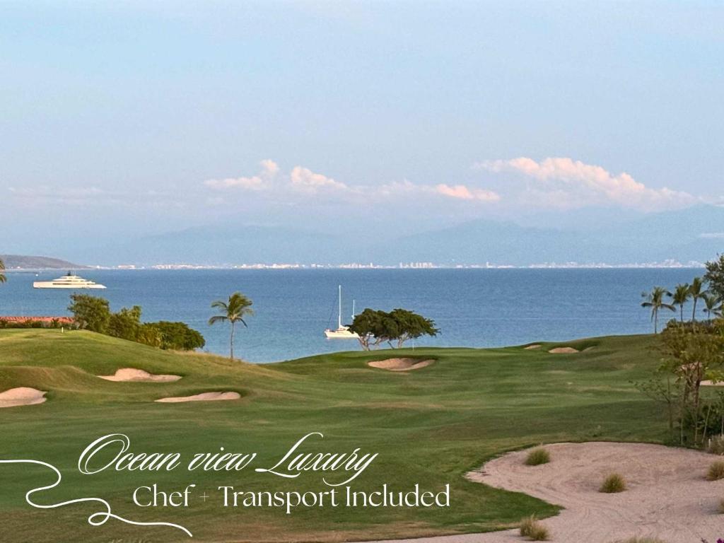 a golf course with the ocean in the background at Ocean view Escape Private Plunge Pool Concierge in Punta Mita