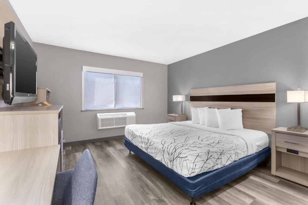 Ένα ή περισσότερα κρεβάτια σε δωμάτιο στο Best Western Blythe