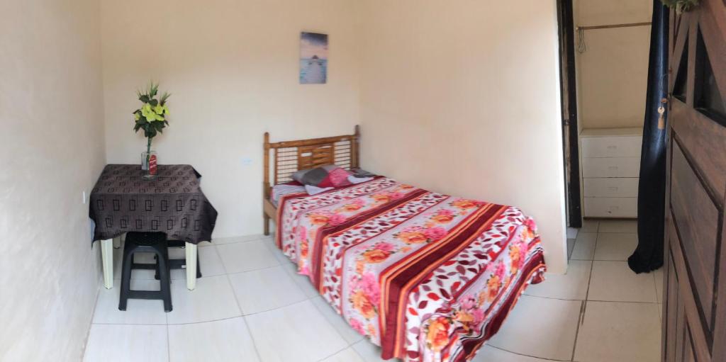 Un pat sau paturi într-o cameră la Hospedaje Maluli 09