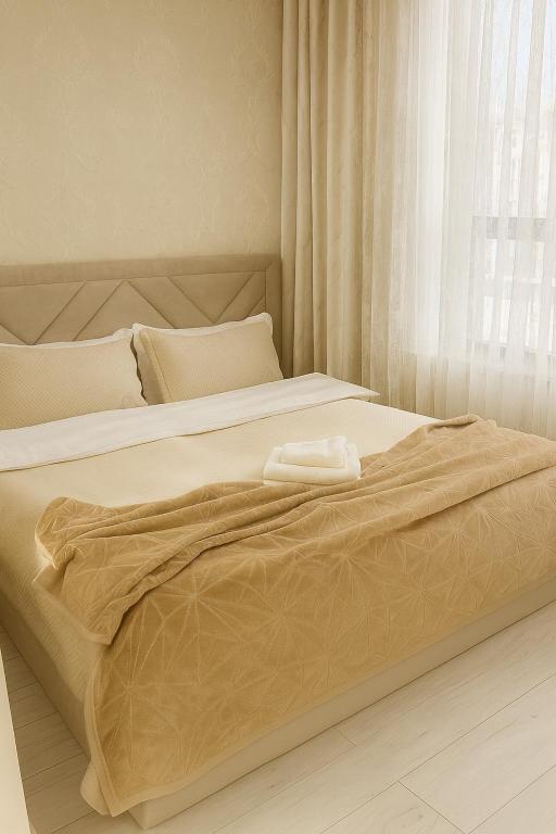 Giường trong phòng chung tại Nomaden-Amir-143