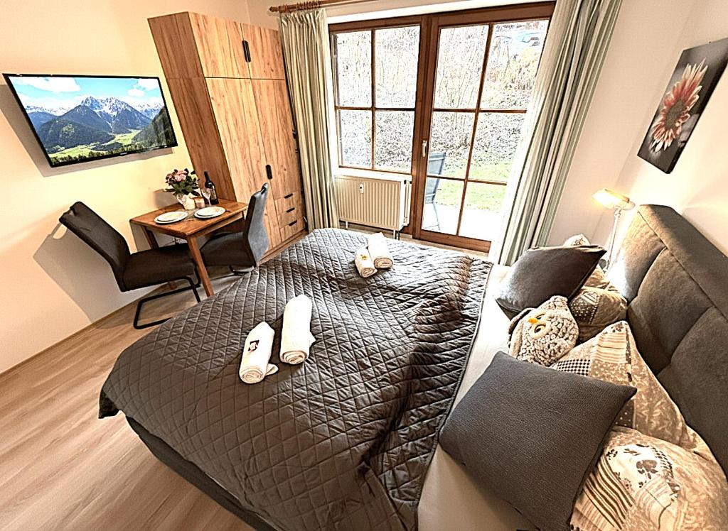 Χώρος καθιστικού στο Gemütliches Apartment im Bayerischen Wald POOL SAUNA WiFi