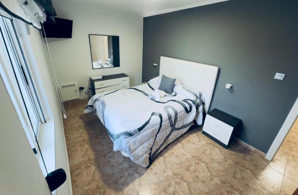 Giường trong phòng chung tại La Casita de Toñita