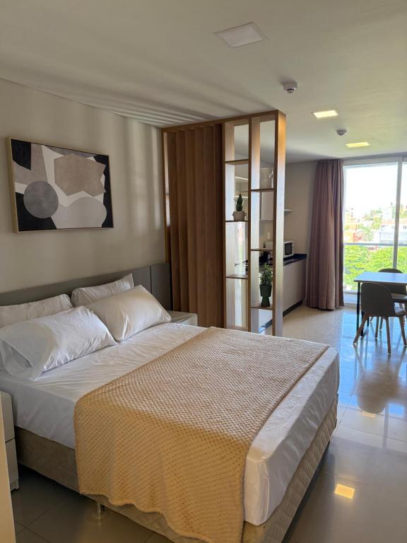 Una cama o camas en una habitación de Monoambiente a 400 metros de la playa