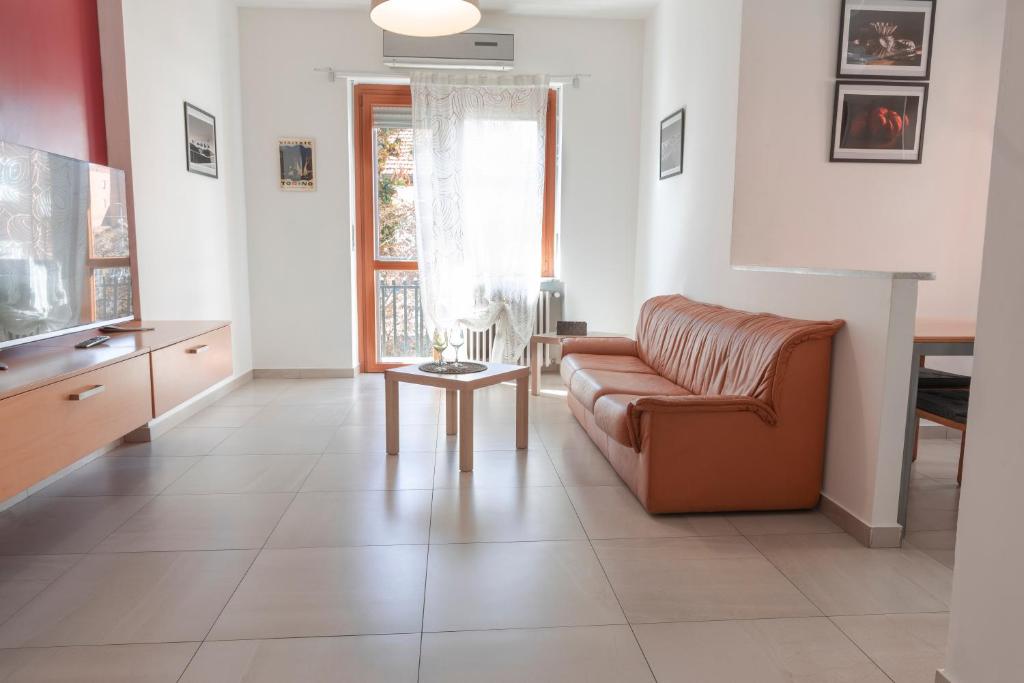 Posezení v ubytování DORA Rooms and terrace, Parco Dora