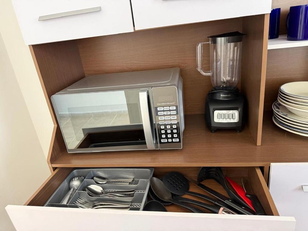 Kuchyň nebo kuchyňský kout v ubytování Las Flores en Quinta La Chata