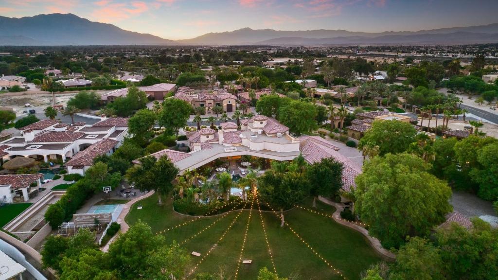 an aerial view of a large house in a city at Villa Verbena by AvantStay Expansive Estate w B-ball Court PoolSpa Entertainers Yard in Bermuda Dunes