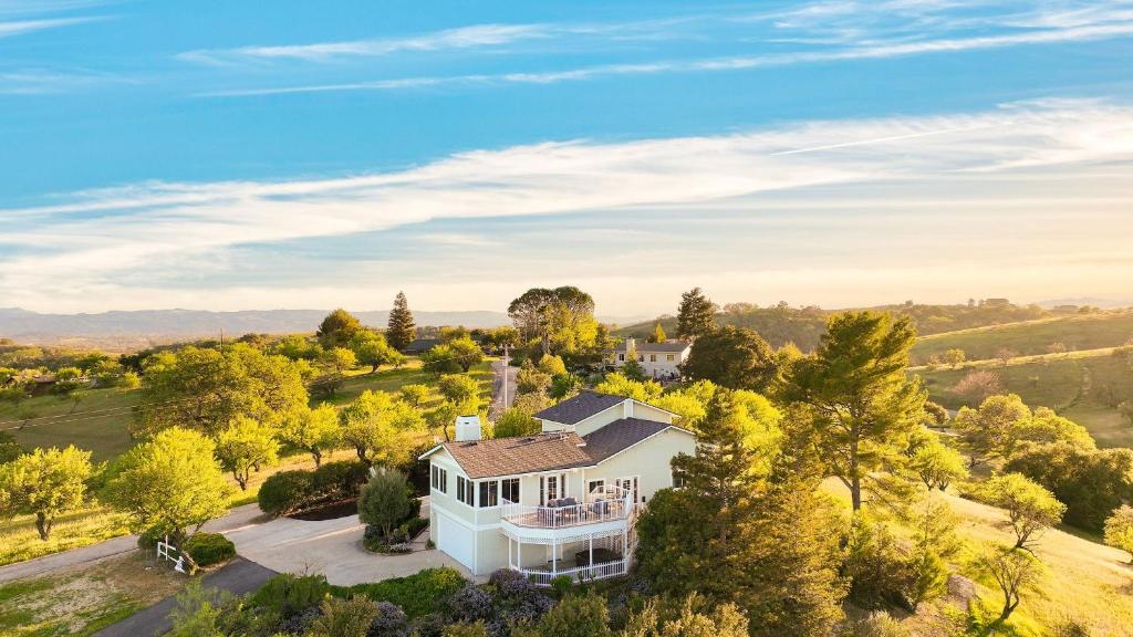an aerial view of a white house with trees at Hilltop by AvantStay Countryside Escape w Views in Paso Robles