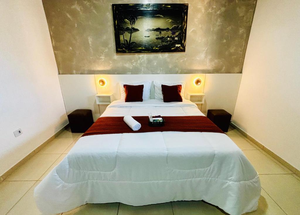 Postel nebo postele na pokoji v ubytování Hospedagem Marechal 03