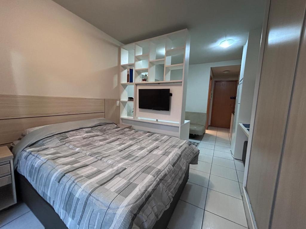 Μια τηλεόραση ή/και κέντρο ψυχαγωγίας στο Apartamento - Life Space Estação