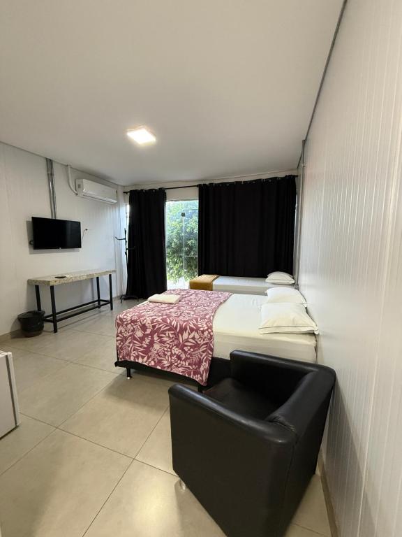 Ένα ή περισσότερα κρεβάτια σε δωμάτιο στο Flat Central