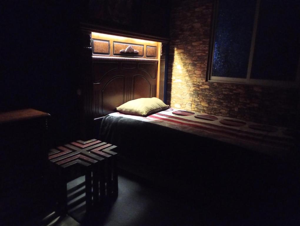 Ένα ή περισσότερα κρεβάτια σε δωμάτιο στο Cómoda habitación para descanso, La casa del artista