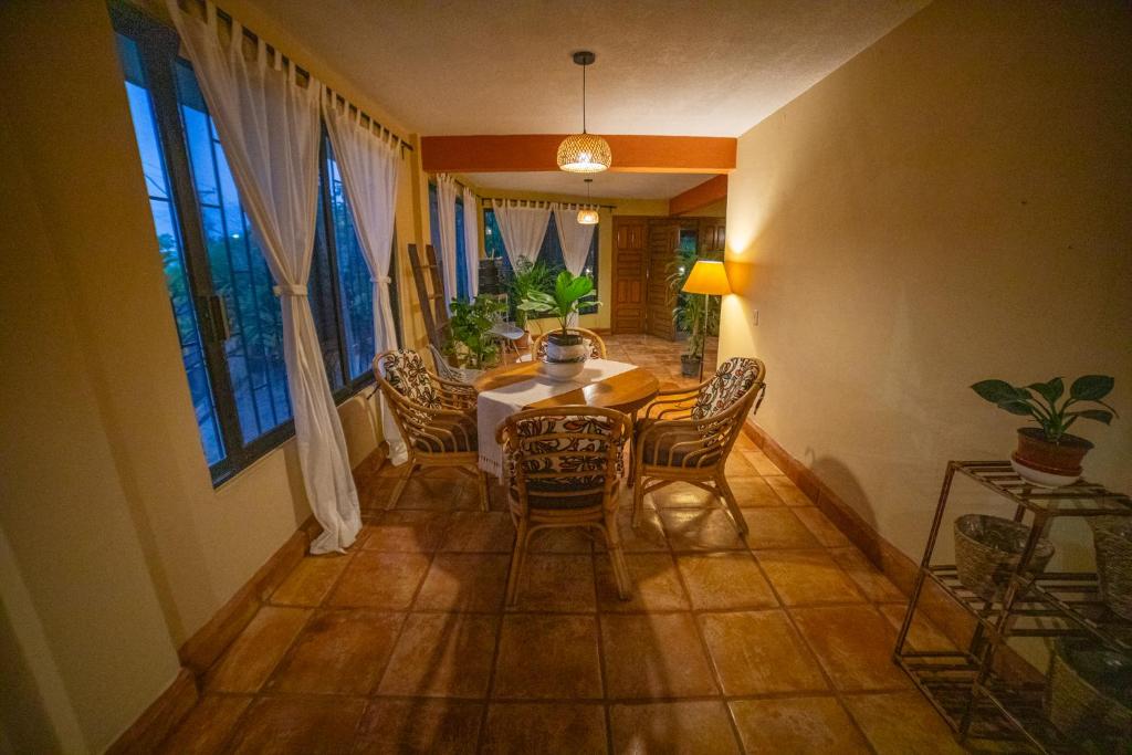 a dining room with a table and chairs at Large family house in Cabo , pet friendly in Cabo San Lucas