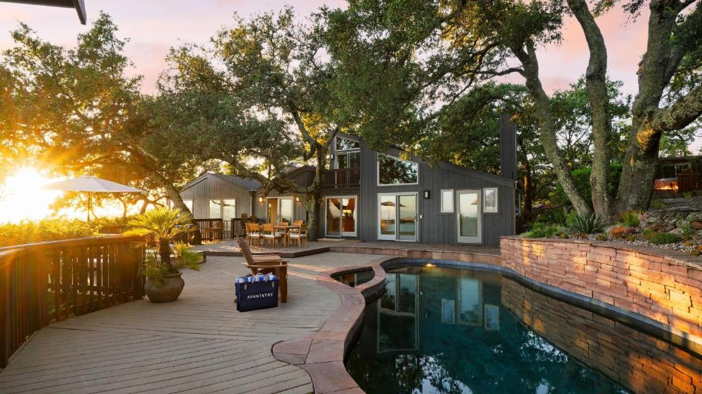 a home with a swimming pool and a house at Sonoma Skyhouse by AvantStay Pool Sauna Hot Tub Stunning Valley Views in Sonoma