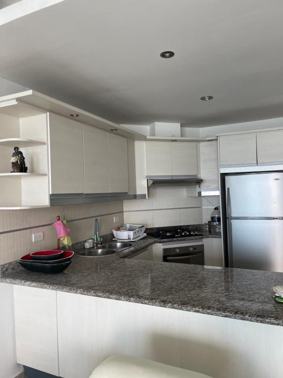 Køkken eller tekøkken på Departamento Diamond Beach Tonsupa