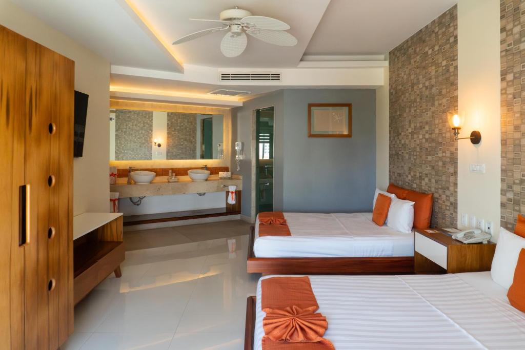 Ένα ή περισσότερα κρεβάτια σε δωμάτιο στο Artisan Playa Esmeralda Family Beach Hotel