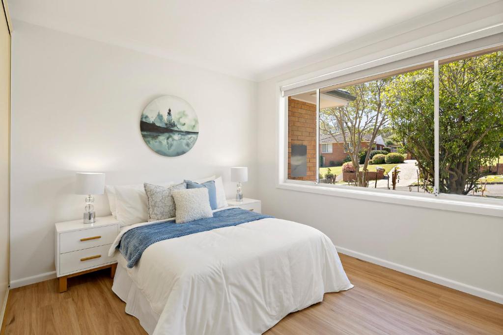 En eller flere senge i et værelse på Premium Five Bedroom House with Swimming Pool