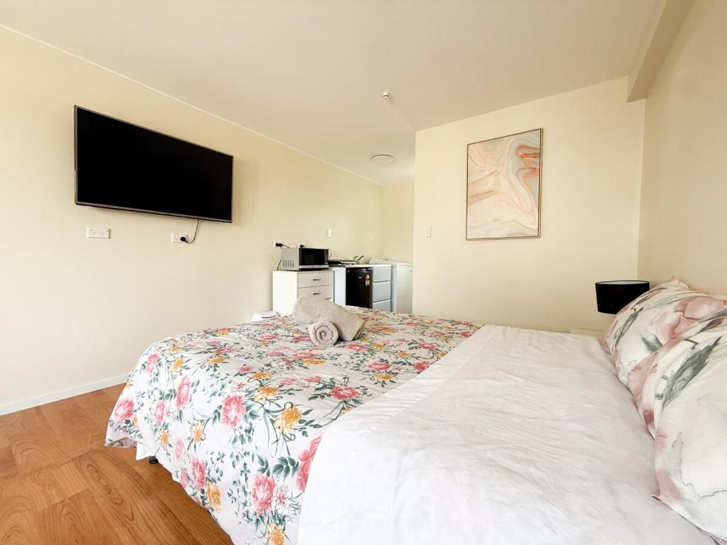 Ένα ή περισσότερα κρεβάτια σε δωμάτιο στο Kilbirnie Studio Near Everything