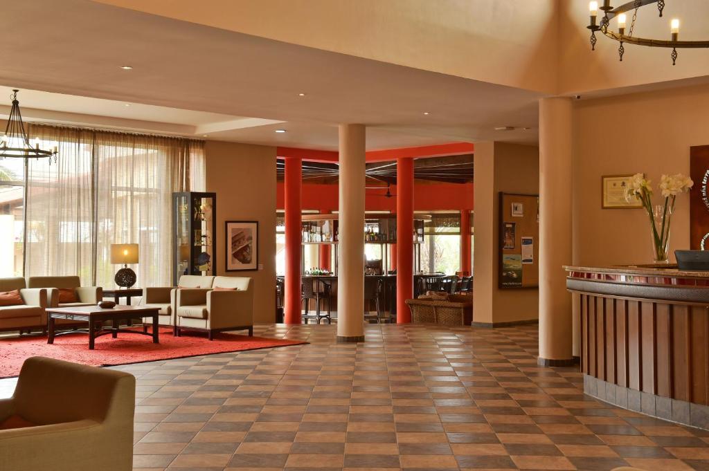 Posezení v ubytování Pestana Tropico Ocean & City Hotel