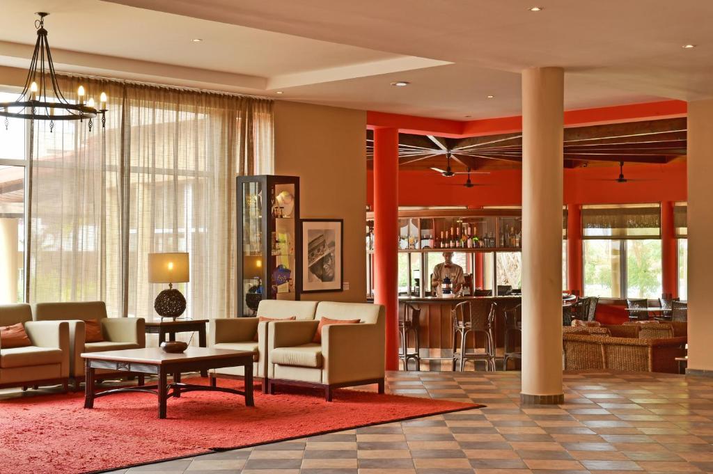 Posezení v ubytování Pestana Tropico Ocean & City Hotel