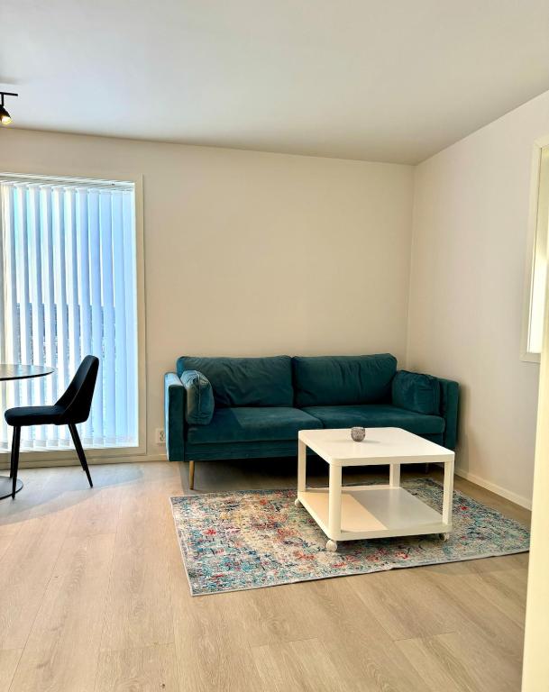 Et opholdsområde på Modern small apartment