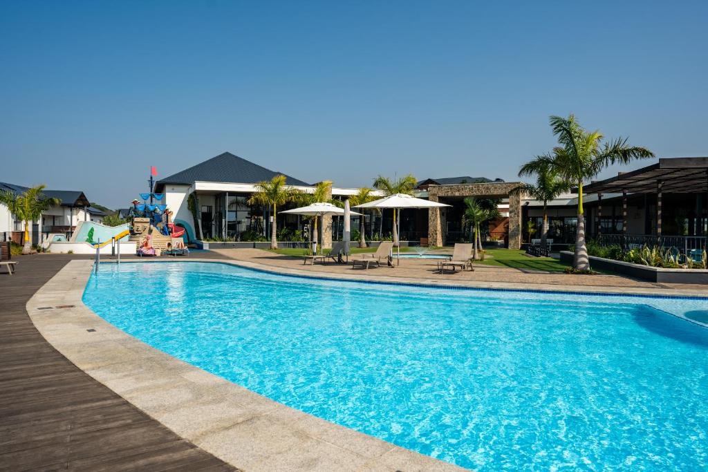 a swimming pool at a resort with at 356 Ballito Hills in Ballito