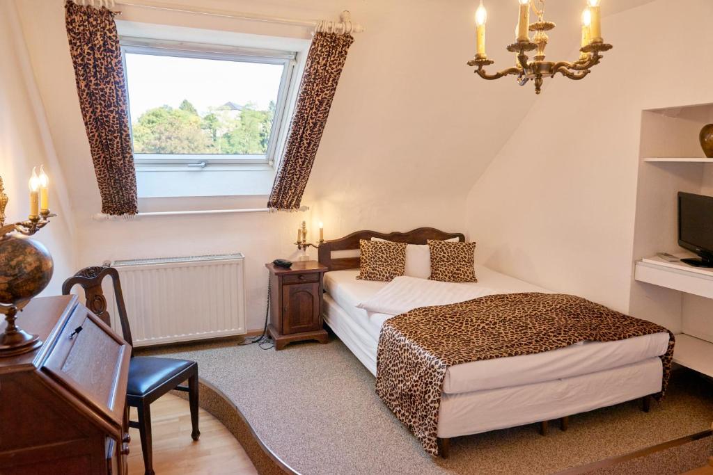 Postel nebo postele na pokoji v ubytování Design-Hotel Zur Abtei