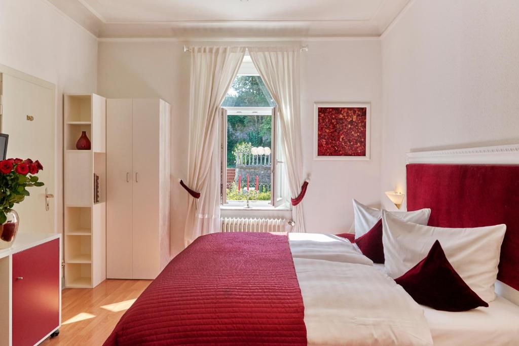 Postel nebo postele na pokoji v ubytování Design-Hotel Zur Abtei