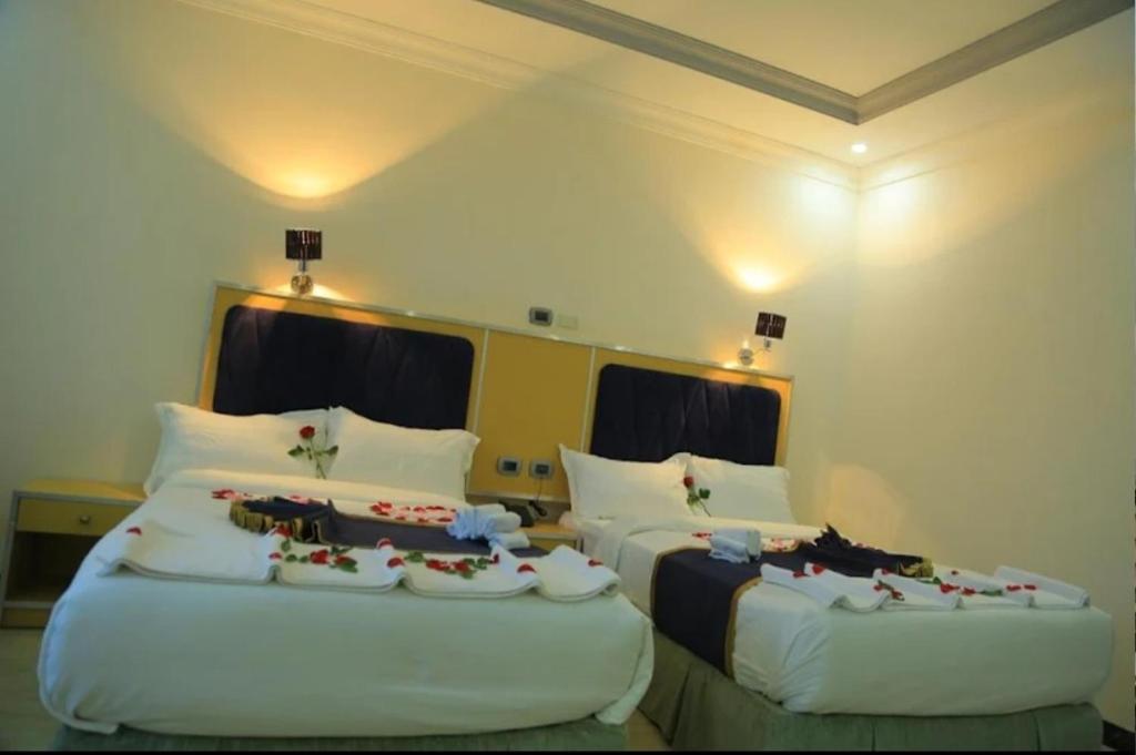 Ένα ή περισσότερα κρεβάτια σε δωμάτιο στο Nova hotel