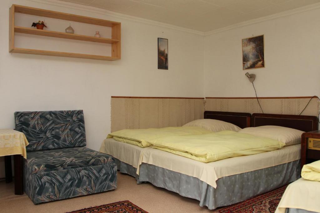Postel nebo postele na pokoji v ubytování Fülöp Vendégház