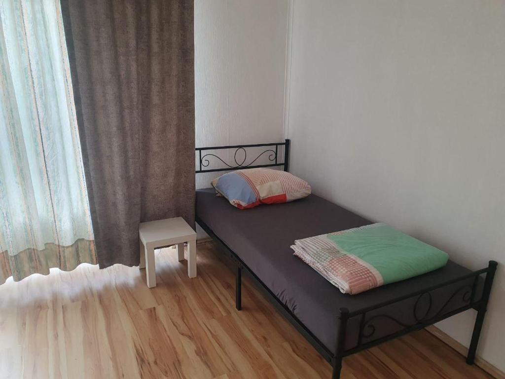 Кровать или кровати в номере Villa Porta Westfalica 2