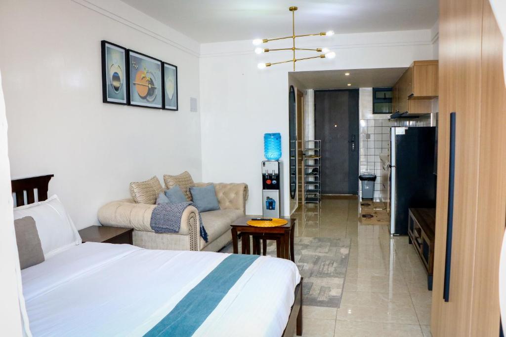 Ένα ή περισσότερα κρεβάτια σε δωμάτιο στο Cozy Loft