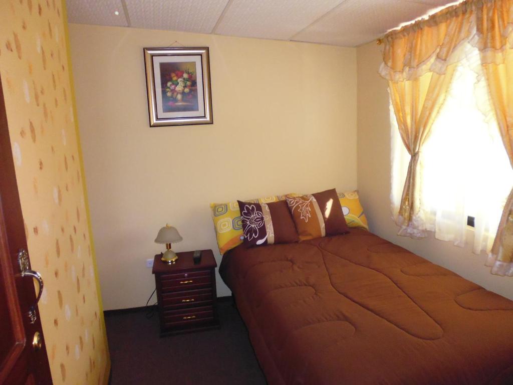 Postel nebo postele na pokoji v ubytování Hotel Residencial El Viajero