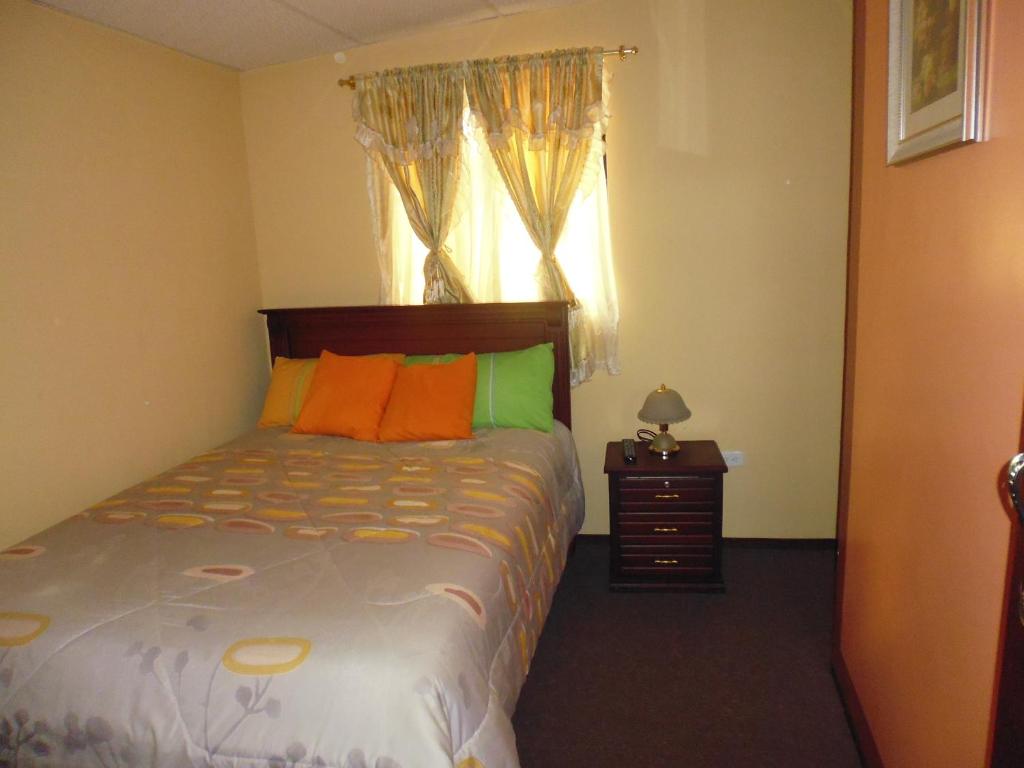 Postel nebo postele na pokoji v ubytování Hotel Residencial El Viajero