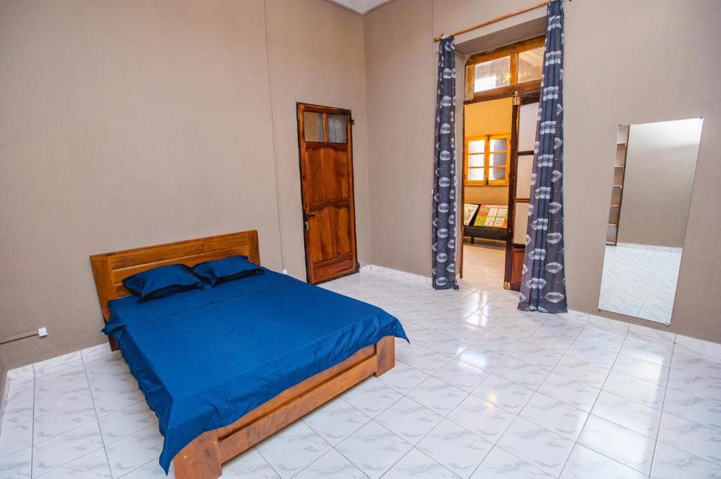 Ένα ή περισσότερα κρεβάτια σε δωμάτιο στο SAPHIR RESIDENCE - Petit Havre de paix en Centre Ville