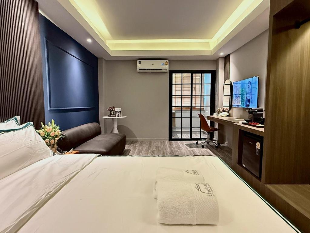 Ένα ή περισσότερα κρεβάτια σε δωμάτιο στο Thebed's Rojana