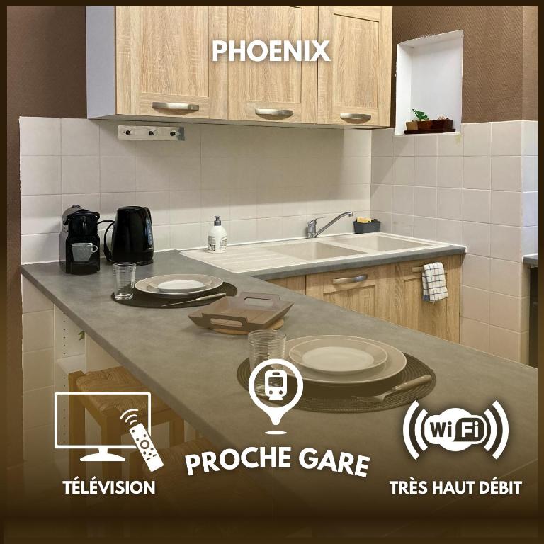a kitchen with a sink and a table with plates on it at Room Phoenix Proche Gare 400m in Montargis