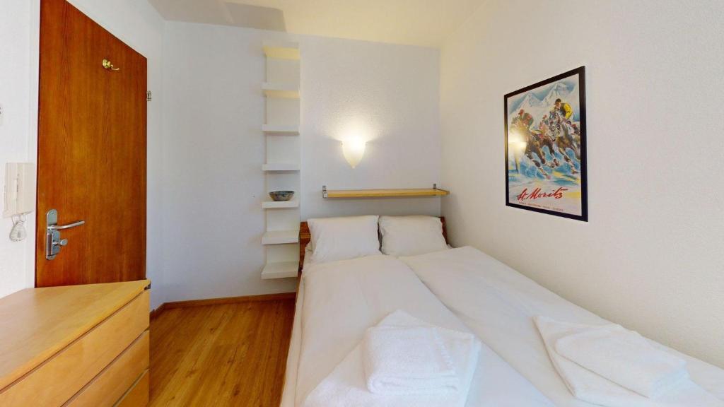 Ένα ή περισσότερα κρεβάτια σε δωμάτιο στο Residenz am See Zimmer 009