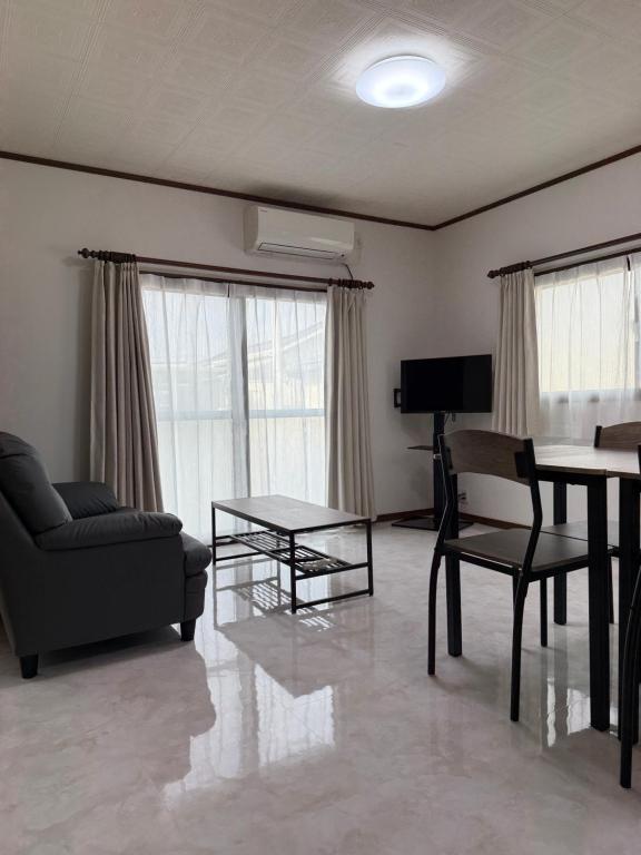 Posezení v ubytování 宿 Oshikiri02