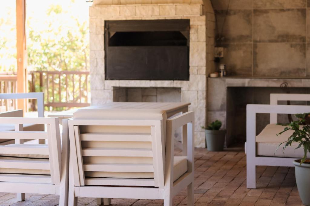 Телевизор и/или развлекательный центр в Rissie's 3 Bedroom Apartment