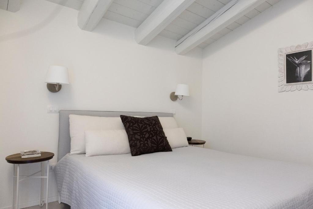 Postel nebo postele na pokoji v ubytování Borgoparvo Countryvilla