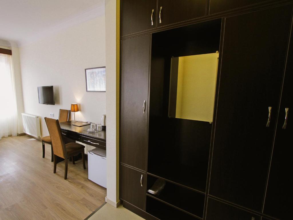 TV a/nebo společenská místnost v ubytování Hotel Lux