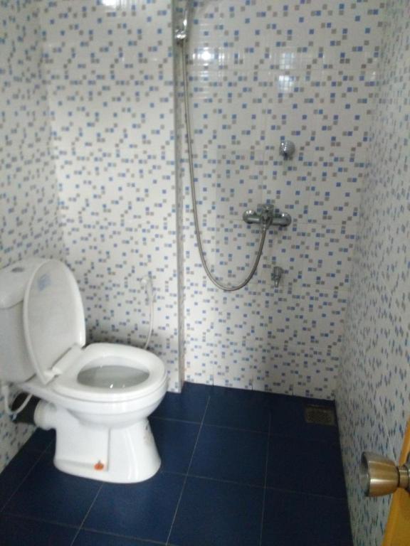 Koupelna v ubytování Nimsara Homestay