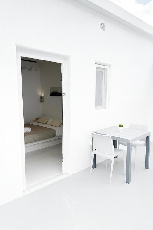 Una cama o camas en una habitación de Erice Fira