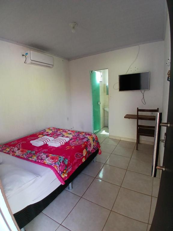 Postel nebo postele na pokoji v ubytování Hotel New