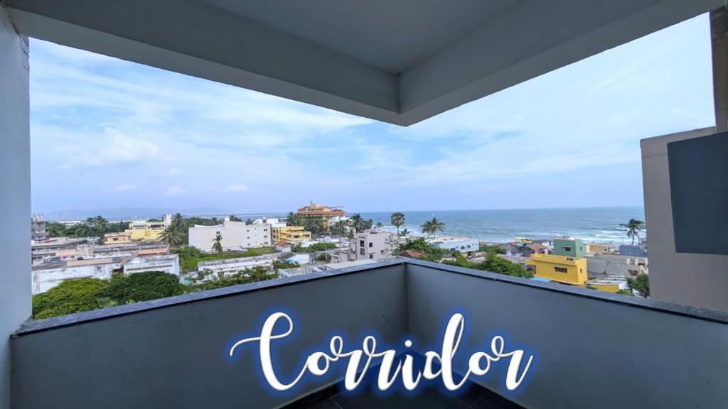 a balcony with a view of the ocean at PS Pristine Sea View Vacation Home in Bhīmunipatnam