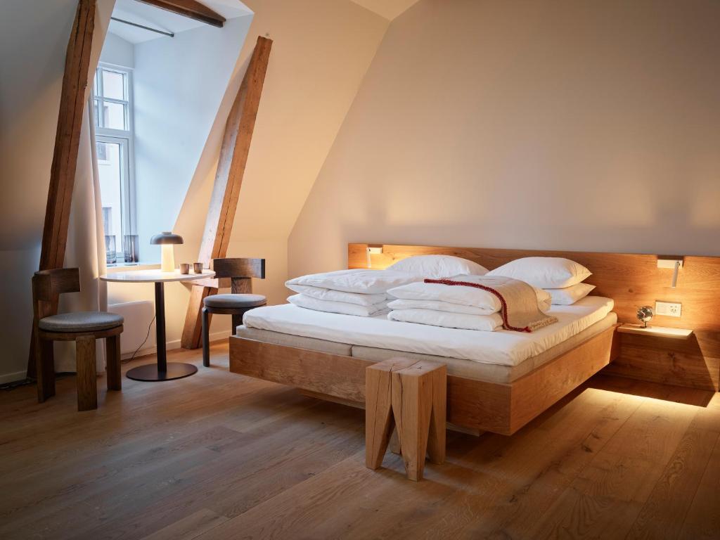 Postel nebo postele na pokoji v ubytování Hotel 1904