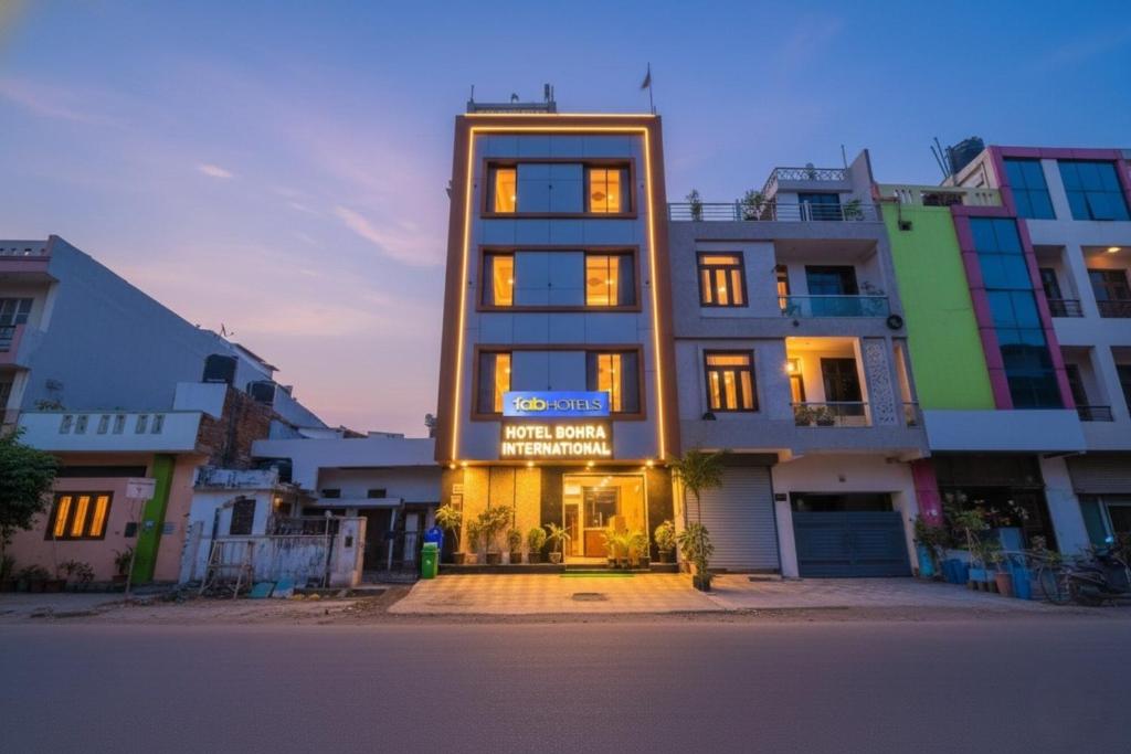 a building with a sign on the front of it at FabHotel Bohra International in Jaipur